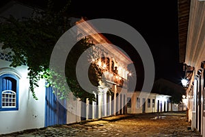 Night view of old colonial houses in historic downtown of Paraty, Brazil
