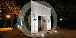 Night view over the `Poarta Sarutului`sculpture by Constantin Brancusi