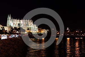 Night view of Palma de Mallorca Cathedral, La Seu, from the port. Palma, Majorca