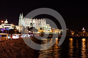 Night view of Palma de Mallorca Cathedral, La Seu, from the port. Palma, Majorca