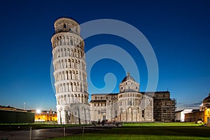 Night view of Pisa Cathedral with Leaning Tower of Pisa on Piazza dei Miracoli in Pisa, Tuscany, Italy. The Leaning Tower of Pisa