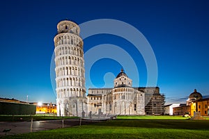 Night view of Pisa Cathedral with Leaning Tower of Pisa on Piazza dei Miracoli in Pisa, Tuscany, Italy. The Leaning Tower of Pisa