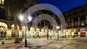 Night view of Placa Reial in Barcelona, Spain