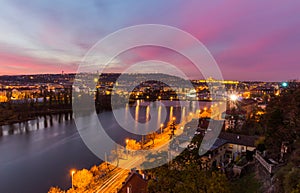 Night view of the prague castle and railway bridge over vltava/moldau river in prague taken from the top of vysehrad castle
