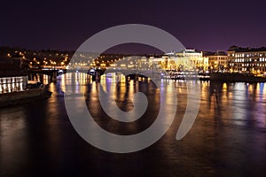 The night View on the Prague National Theater above the River Vltava, Czech Republic