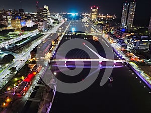 Night view of the Puente de la Mujer in Puerto Madero photo