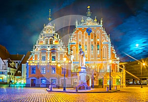 Night view of the Ratslaukums square with the House of Blackheads in old town of Riga in Latvia....IMAGE