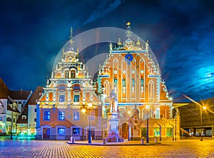 Night view of the Ratslaukums square with the House of Blackheads in old town of Riga in Latvia....IMAGE