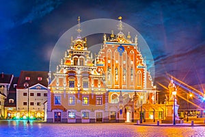 Night view of the Ratslaukums square with the House of Blackheads in old town of Riga in Latvia....IMAGE