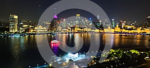 Night view of red yacht in the Huangpu River in Shanghai