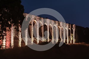 Night  view of the remains of an ancient Roman aqueduct located between Acre and Nahariya in Israel