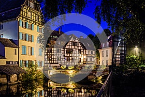 Night view of the river Ill canal in the Petite France quarter in Strasbourg, France