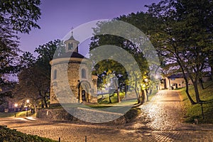 Night view of the rotunda of saint martin situated inside of the grounds of Vysehrad castle in Prague. Summer night.