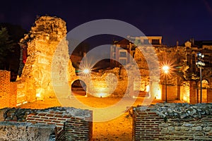 Night view of the ruins of thermae of ancient Roman Odessos in the light of searchlights, in the city of Varna