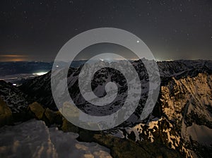 Night view from Rysy peak during winter towards Liptov photo