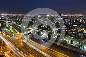 Night view of Santiago de Chile toward the east part of the city, showing the Mapocho river and Providencia and Las Condes distric