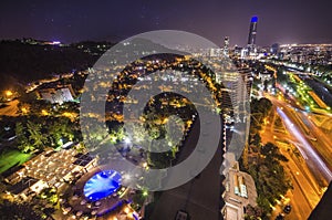 Night view of Santiago de Chile toward the east part of the city, showing the Mapocho river and Providencia and Las Condes distric