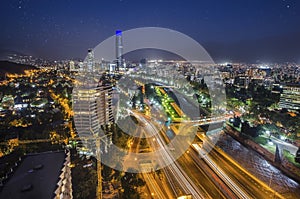 Night view of Santiago de Chile toward the east part of the city, showing the Mapocho river and Providencia and Las Condes distric