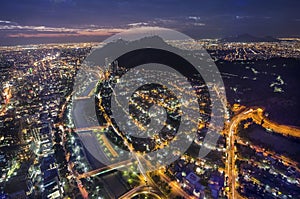 Night view of Santiago de Chile toward the east part of the city, showing the Mapocho river and Providencia and Las Condes distric photo