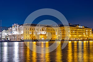 Night view of Savoia Excelsior Palace in Italian town Trieste