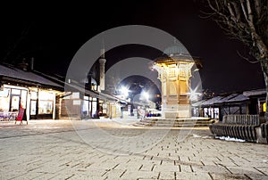 Night view of the Sebilj, wooden fountain in Sarajevo photo