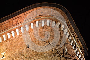 Night view of senatorska tower on wawel royal castle in cracow in poland