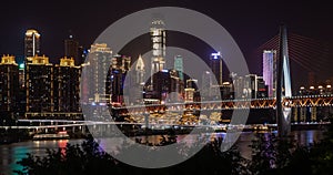 Night view of skyline cross Jialing River with Qiansimen Bridge in Chongqing