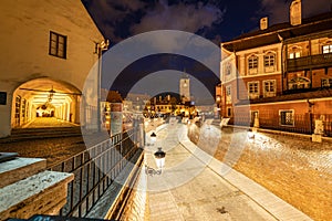 Night view from small square liars bridge Sibiu, Romania, Europe. Blue sky and council tower