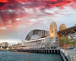 Night view of Sydney Harbor Bridge from the Wharf at sunset, Australia