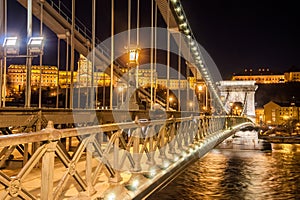 Night view of the Szechenyi Chain Bridge on the River Danube in Budapest