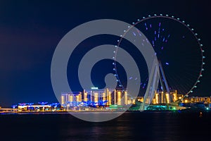 Night view to the Ain Dubai, giant Ferris at Bluewaters Island close to JBR beach.