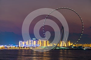 Night view to the Ain Dubai, giant Ferris at Bluewaters Island close to JBR beach.