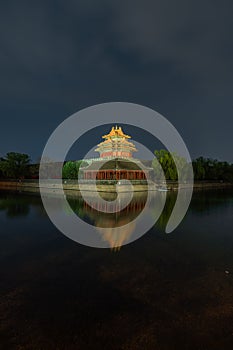 Night view of the Turret of Forbidden city in Beijing, China. The Forbidden City was the imperial capitol of ancient Chinese dynas