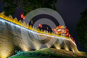 Night view of the Zhaoqing Ancient City Wall with Pi Yun Lou building