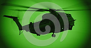 Night vision footage of a military helicopter on a night rescue mission
