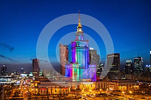 Night in Warsaw, Poland with rainbow architectural lighting