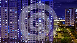 Night window timelapse. architecture of the night city, urbanistic view of the building