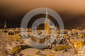 Night winter view of Oleviste cathedral and old city surrounding