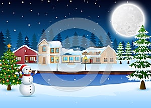 Night winter village landscape with christmas tree and snowman