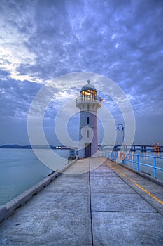 Nightfall on Singapore Lighthouse at Tuas photo