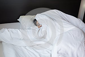 Nightmare or bad dream,Woman with scare and panic while lying down under the blanket in bedroom