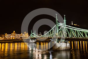 Nightshot at bridge on Danube river photo