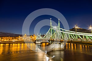 Nightshot at chain bridge on Danube river with lights