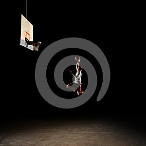 Nighttime basketball player