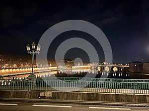 Nighttime Charm of Pont Neuf Illuminated by Lamplight from Saint-Pierre Bridge, Toulouse
