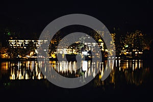 Nighttime landscape light reflections Mirror Lake Lake Placid NY