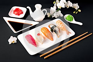 Nigiri with salmon, tuna, perch, eel, scallop, caviar, shrimp, sharp. Gunkan sushi set.