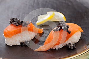 Nigiri Sushi with Fresh Salmon and Black Caviar