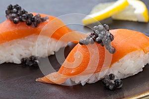 Nigiri Sushi with Fresh Salmon and Black Caviar