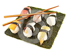 Nigirizushi sushi over nori sheet